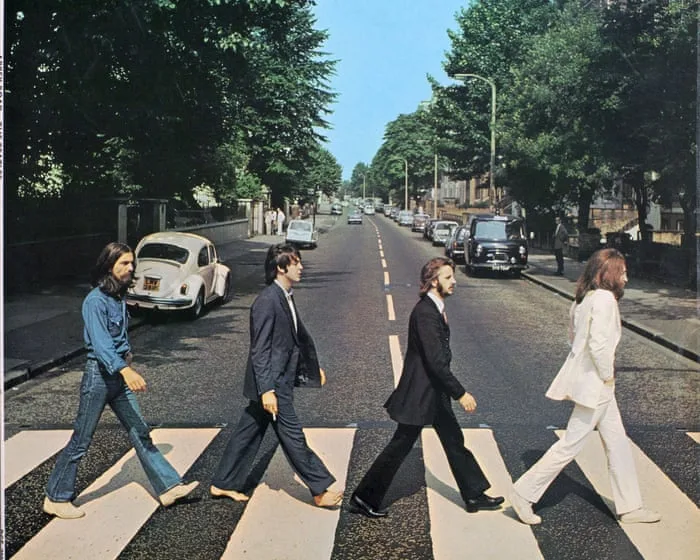 Four blokes and a zebra crossing: the banality and beauty of the Beatles’ Abbey Road cover