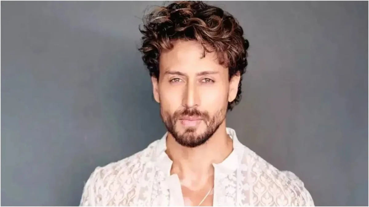 Tiger Shroff covers face, reaches home under police protection after Juhu firing