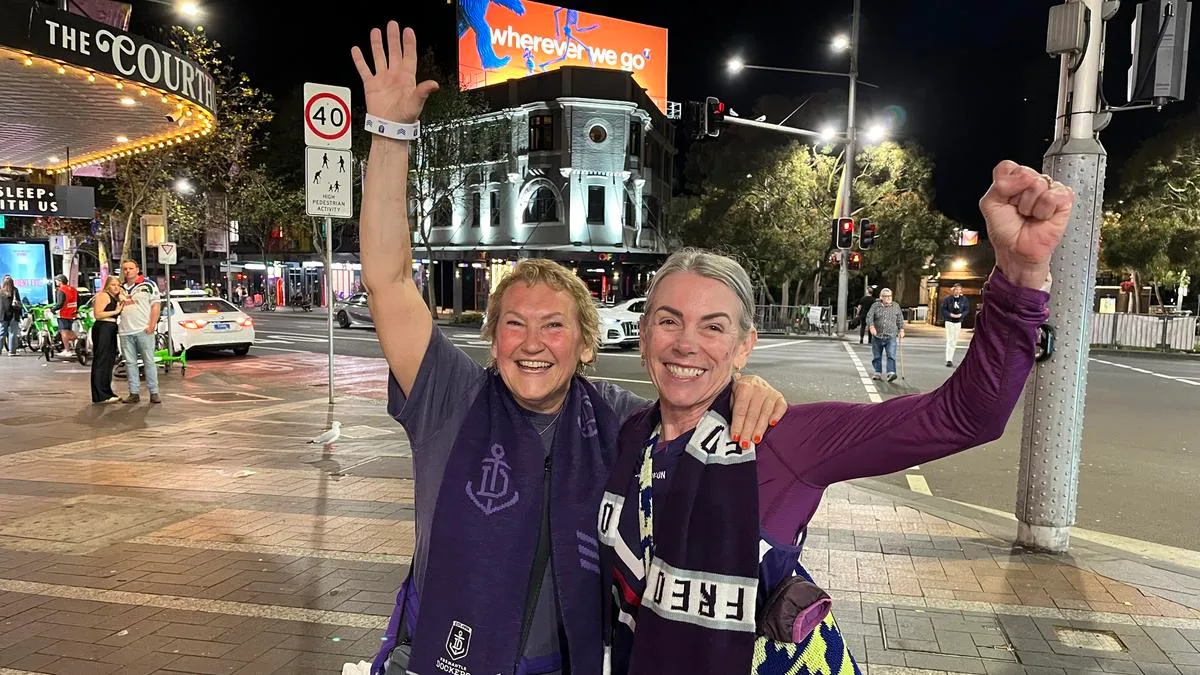 Passionate Fremantle Dockers fans are prepared to travel anywhere to be at MCG for historic grand final