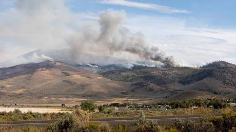 Human-caused wildfire forces 42,000 to flee in Nevada (VIDEOS)