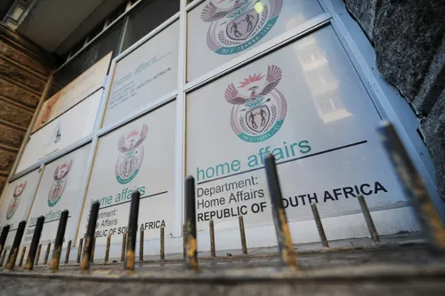 Former Home Affairs officials linked to alleged ‘photo-swapping’ passport syndicate arrested