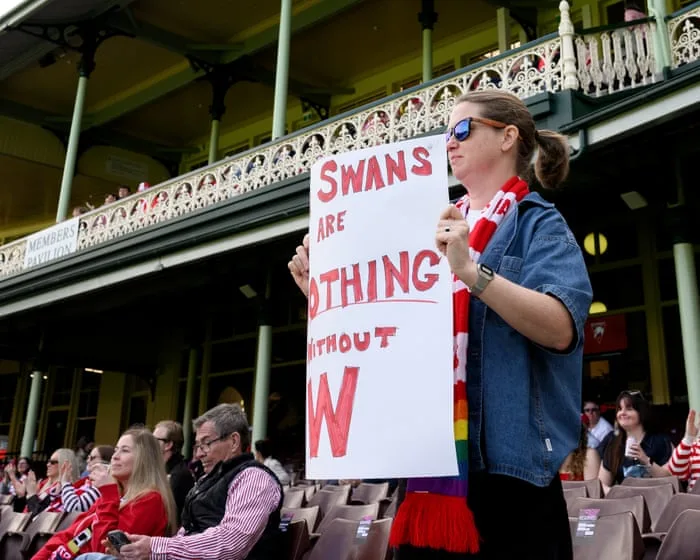 Sydney Swans fans turn out to support AFLW team but hundreds walk out before men’s match