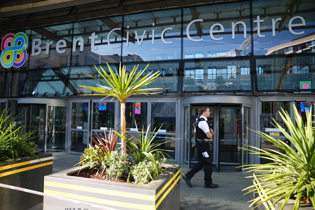 Murder investigation launched as young man dies after stabbing at council HQ