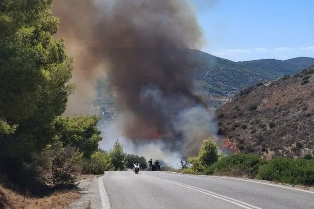 Salamina fires - live: Greek island filled with Brits in flames as evacuations ordered