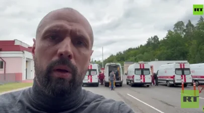 Корреспондент RT Васюнин показал обстановку на месте обмена бойцами с Украиной