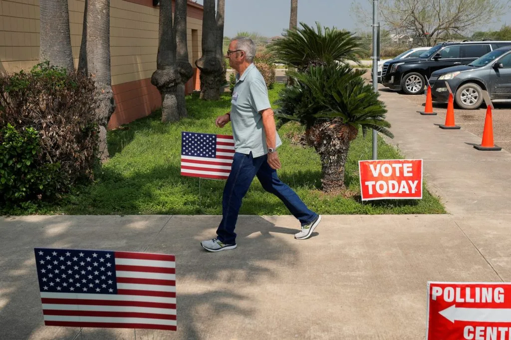 Plan to cut polling sites in major Texas county draws protests as Senate battle looms