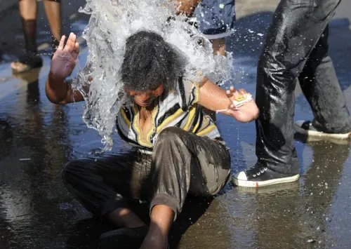 Be warned! Pouring water on someone is a criminal offence