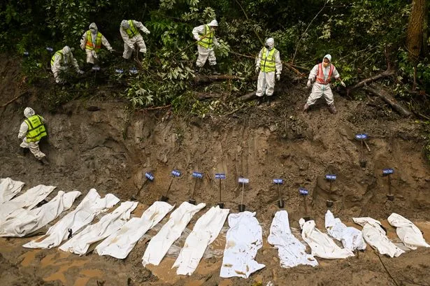 Mass burials carried out across flood-hit Nepal as search for missing Brits continues