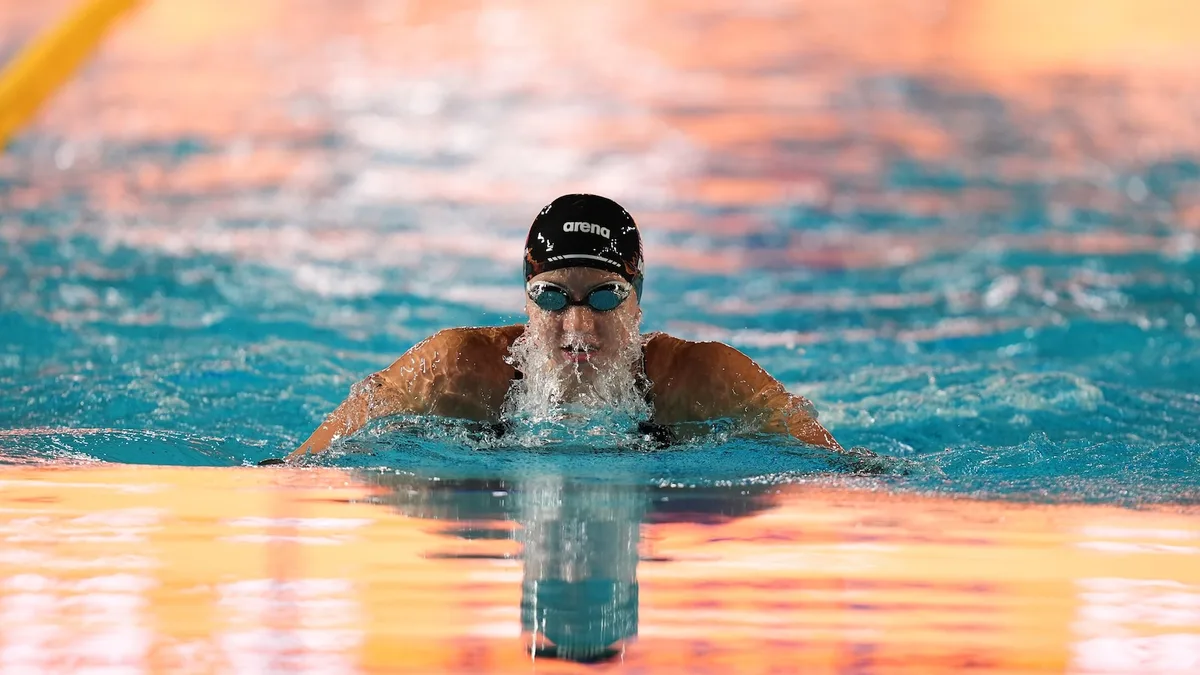 Kate Douglass blazes to 50 free world record in Pan Pacific prelims