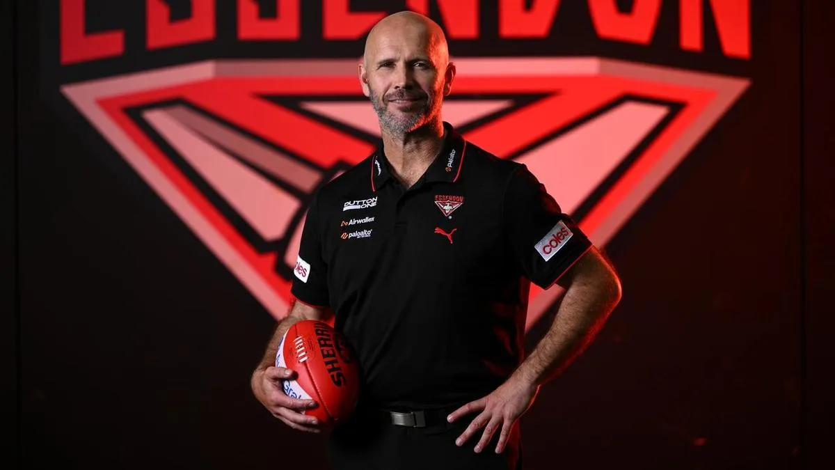 GWS assistant Shane Mumford joins old Giants colleague Mark McVeigh at Essendon