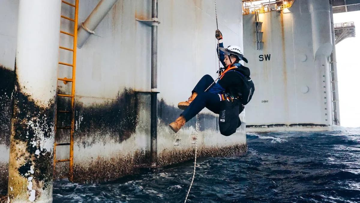 Greenpeace forces suspension of work on Woodside gas rig, 240km off WA coast