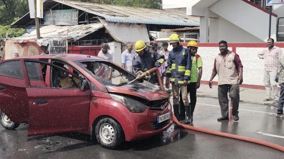 Two escape unhurt after car catches fire in Vellore