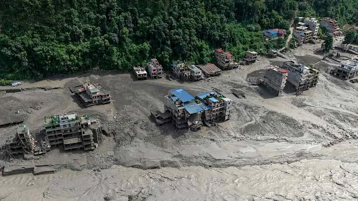 Hundreds reported missing after flood on Nepal border with China