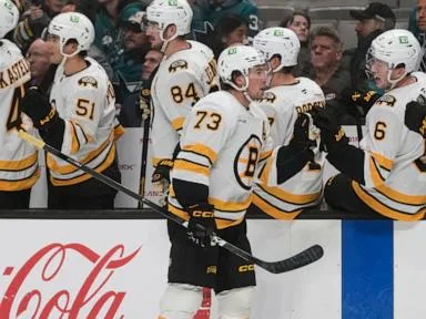 McAvoy scores in his 1st game back from a suspension to lead the Bruins past the Sharks 6-3