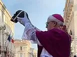 Vatican cardinal kisses 1,700-year-old skull in rare ancient Catholic ritual that divides Christians
