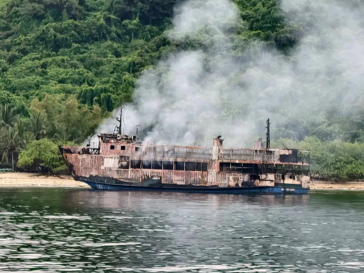 Smoke from charred ferry in Philippines hampers search efforts for 84 people missing