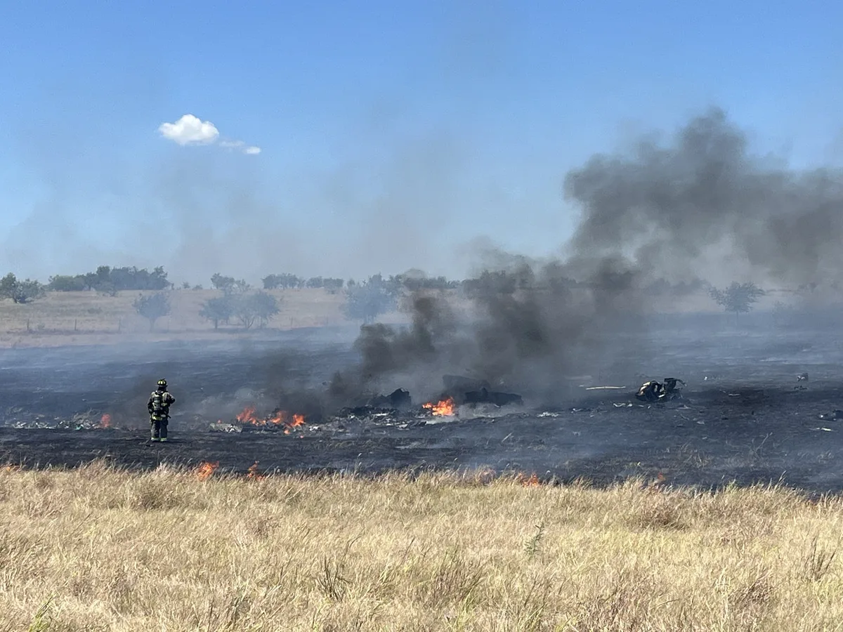 Two soldiers are dead after a military helicopter crashes in Texas, sparking a fire