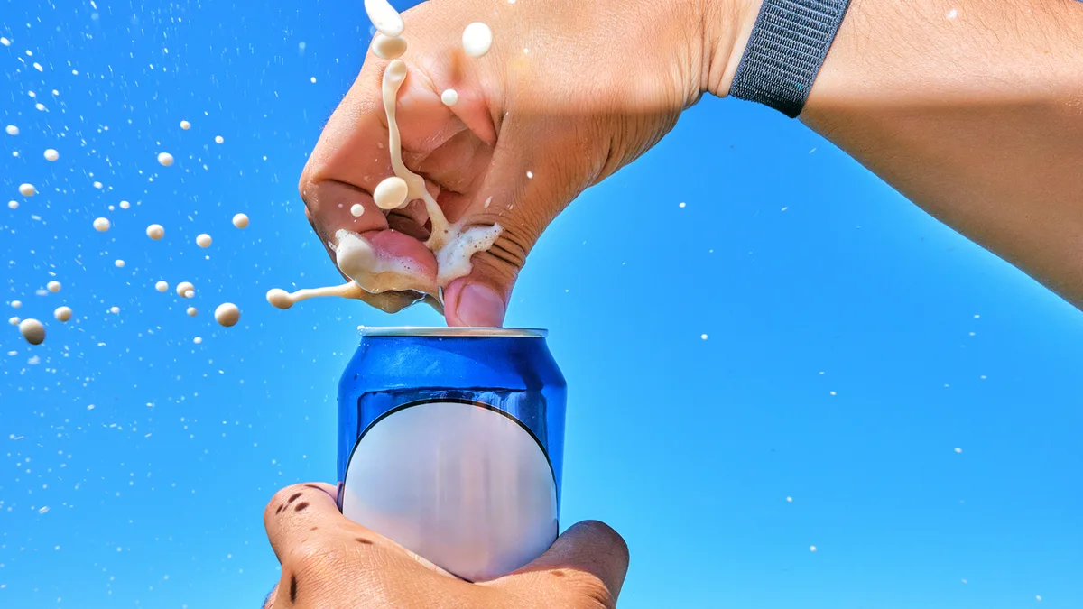 Does tapping on a soda can really stop it from exploding?