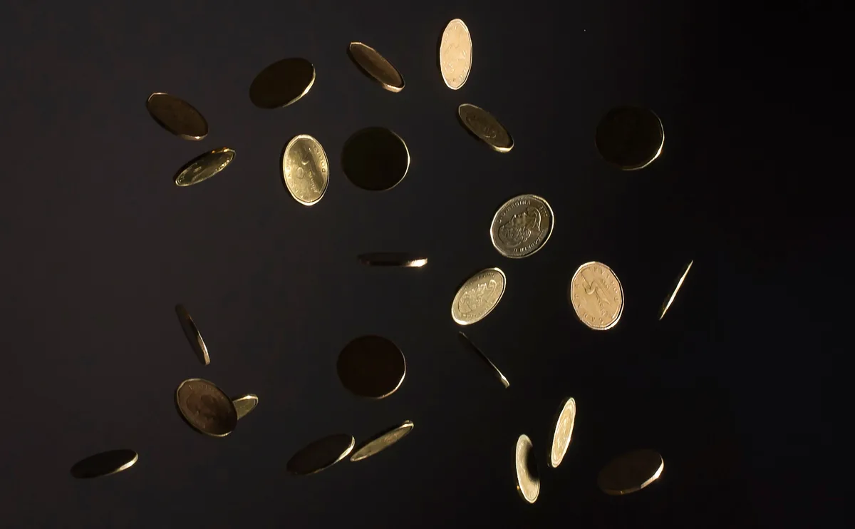 Canadian dollar hits 18-month low as jobs data clips rate hike bets