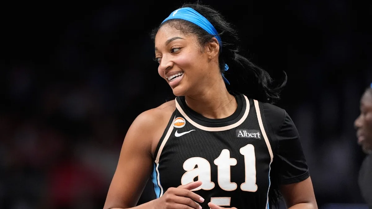 Dream forward Angel Reese sets two rebounding records in win
