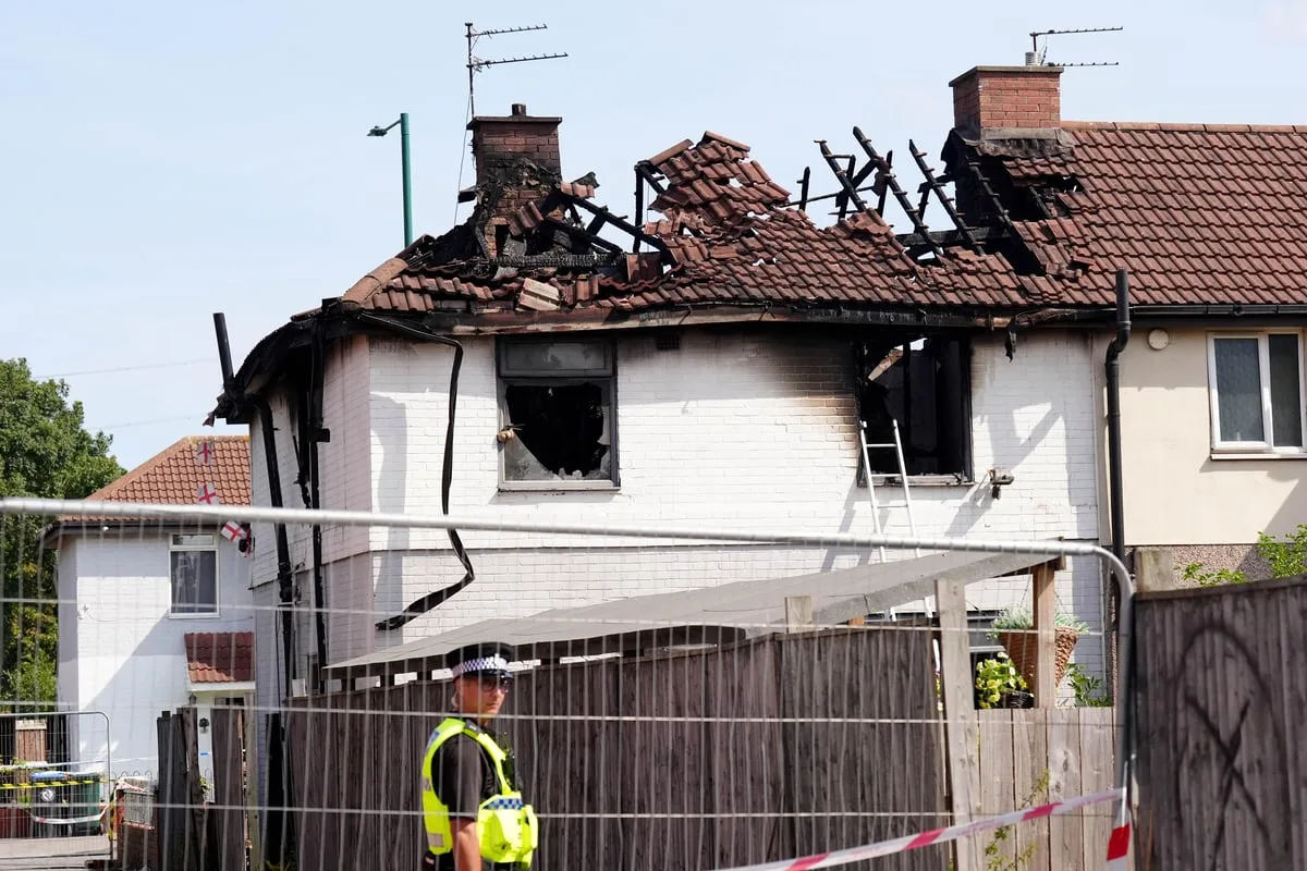 Man, 23, charged with two counts of murder after fatal house fire