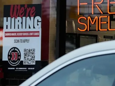 Americans filing for jobless aid remain at historically low levels below 200,000