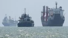 China warns it will safeguard its interests after US widens sanctions against Iran