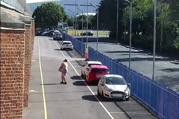 Hapless moment bungling crook fails three times to throw £12,000 worth of drugs over a prison wall