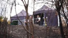 Murder probe after wildfire uncovers body in park