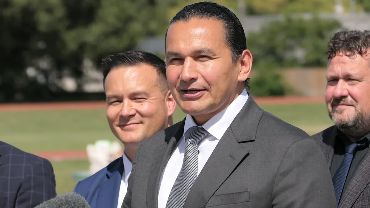After days of giving French-only answers in legislature, Kinew wants schools to cover '80s language battle