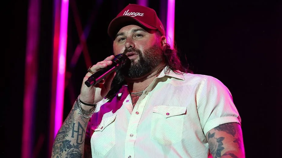 Viral video captures Koe Wetzel bringing young fan on stage after spotting issue in the crowd at his concert