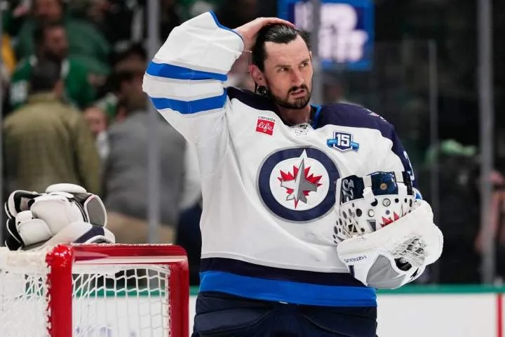 Winnipeg Jets suspend Connor Hellebuyck after he fails to report to training camp